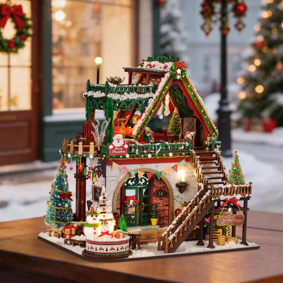 Lit wooden Christmas lodge miniature with snowy roof garlands tiny fir trees and a snowman