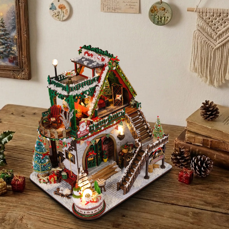 Miniature house kit Snowy Christmas lodge with warm LED lights