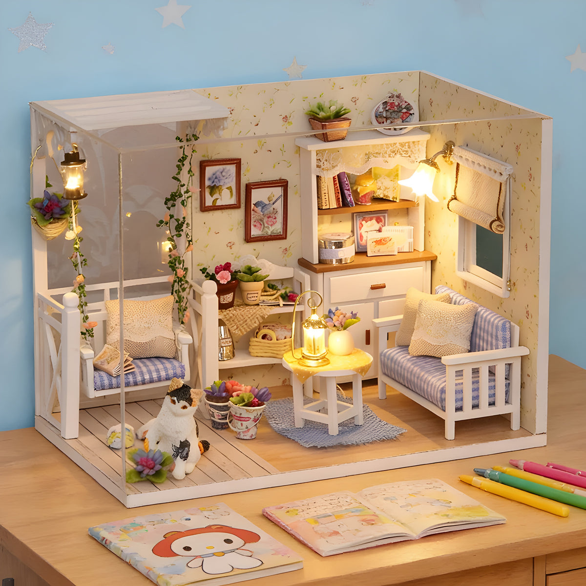 Kitten Diary miniature room assembled on a desk, warm LED lighting