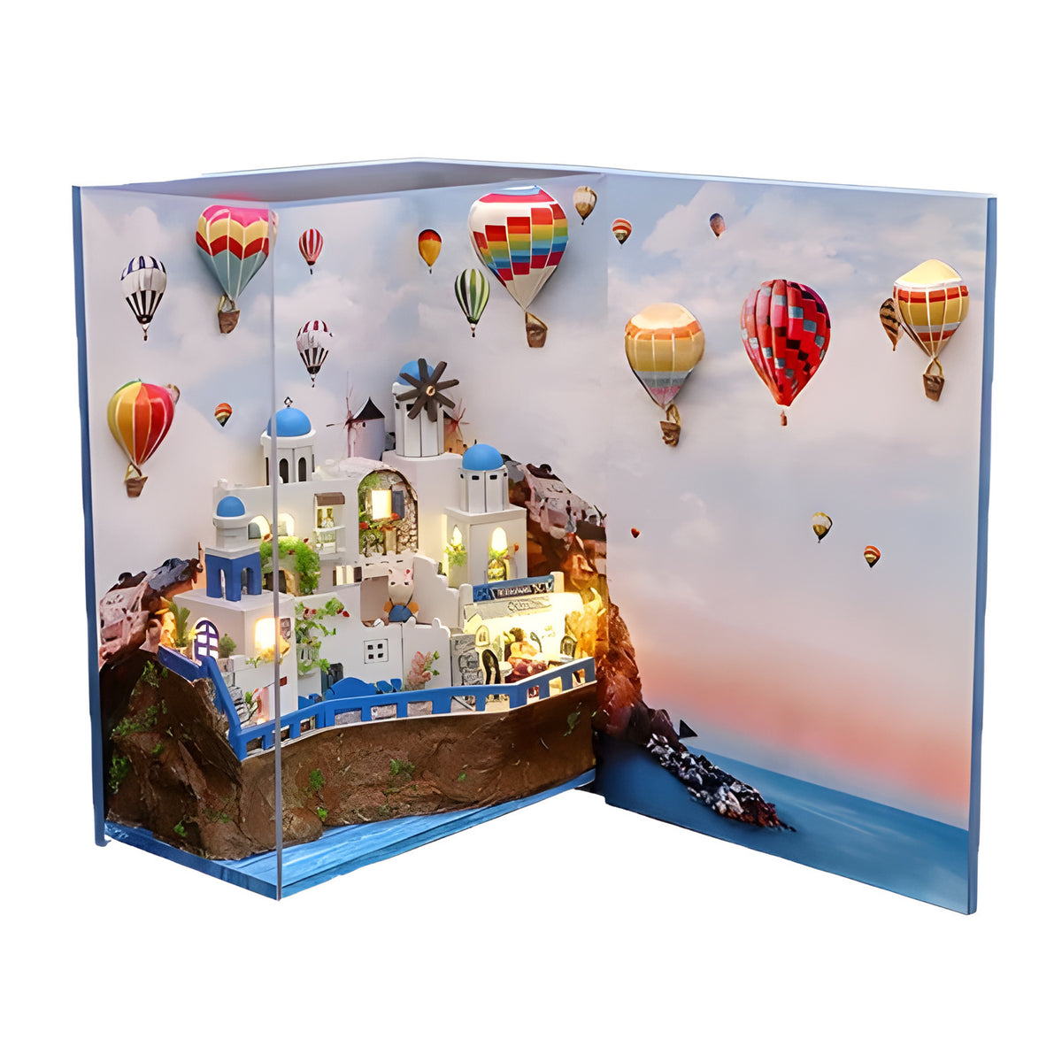 Santorini book nook DIY kit: whitewashed village on a cliff with hot air balloons, LED lit