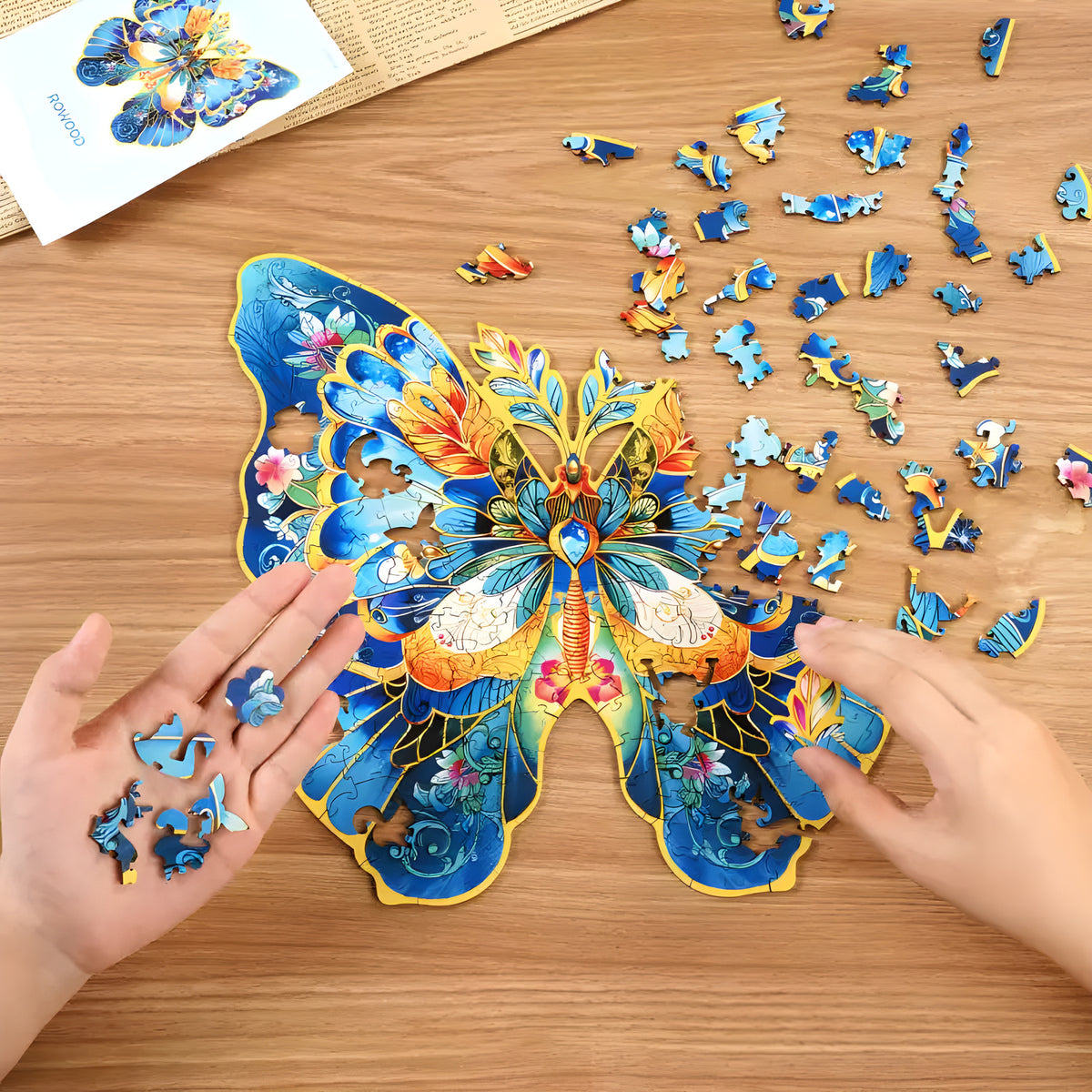 Butterfly Flight jigsaw puzzle. Delicate 200-piece illustration of butterflies in flight among colorful flowers. Perfect for framing once complete.