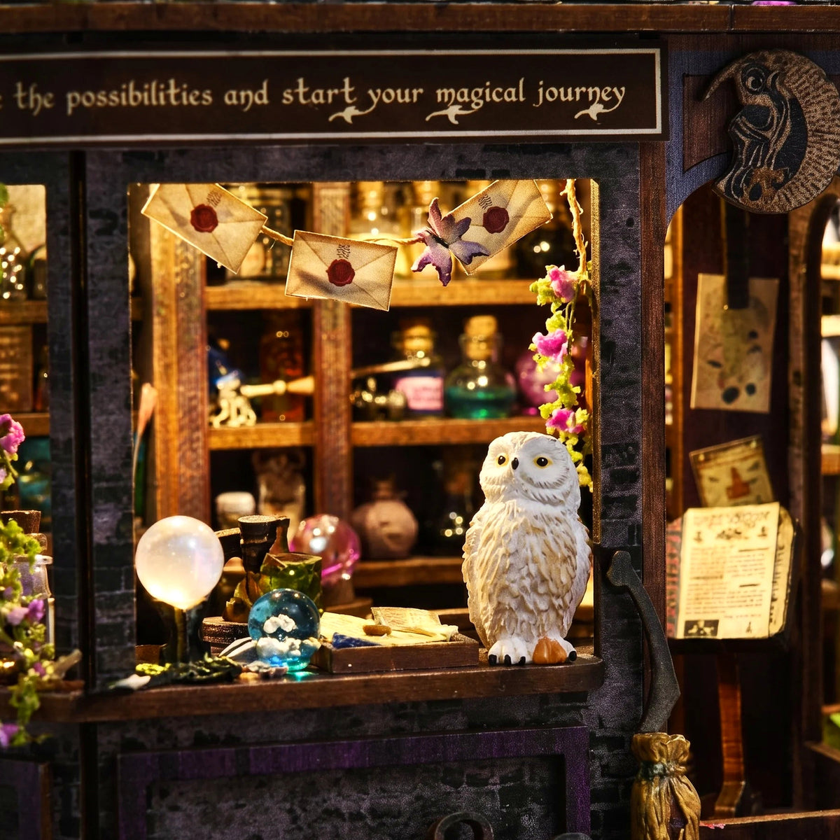 Close-up of the shop counter with the snowy owl and crystal ball