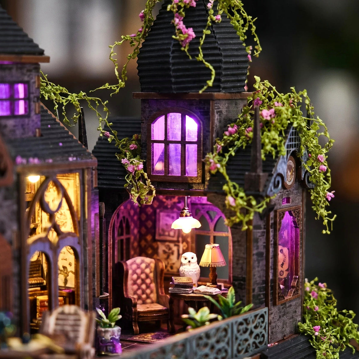 Close-up of the lit violet attic window and reading corner